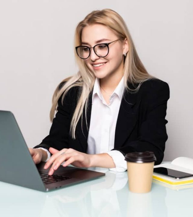 office girl image working on laptop